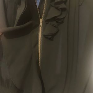 Express see through jacket/blouse with zipper . Ruffles in front .100% polyester